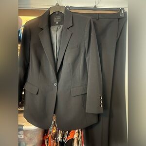 A black limited 2 piece business suit.